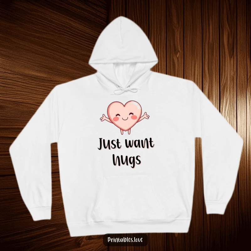 Funny hoodie featuring a sweet heart character in a cheerful, open-armed hug, perfect for spreading warmth and happiness.