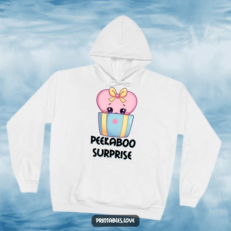 Funny hoodie depicting a curious heart character peeking with wide eyes from behind a large, colorful gift box.