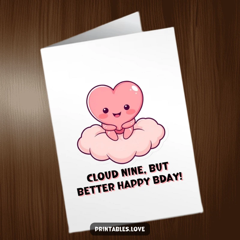 Funny Free Printable Birthday Card featuring a happy heart character resting on a heart-shaped cloud, smiling brightly, a charming downloadable.